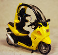 Dickie 3385634 2000 BMW C1 gelb 1:24 Fertigmodell