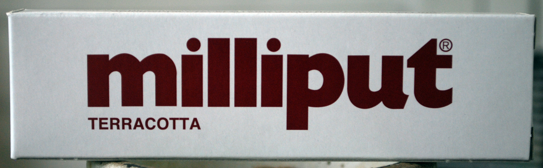 Milliput terracotta 4 oz= 113,4 Gr.