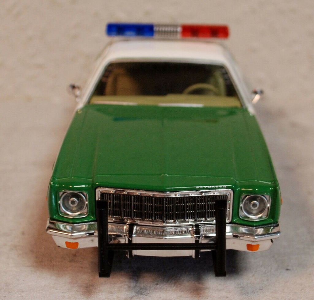 1975 Plymouth Fury Chickasaw County Sheriff 1:24 Green Light 84096