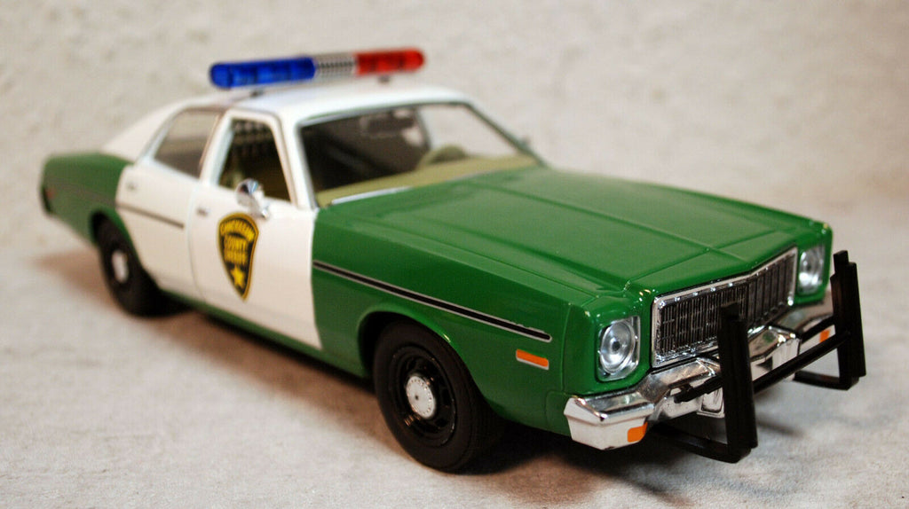 1975 Plymouth Fury Chickasaw County Sheriff 1:24 Green Light 84096