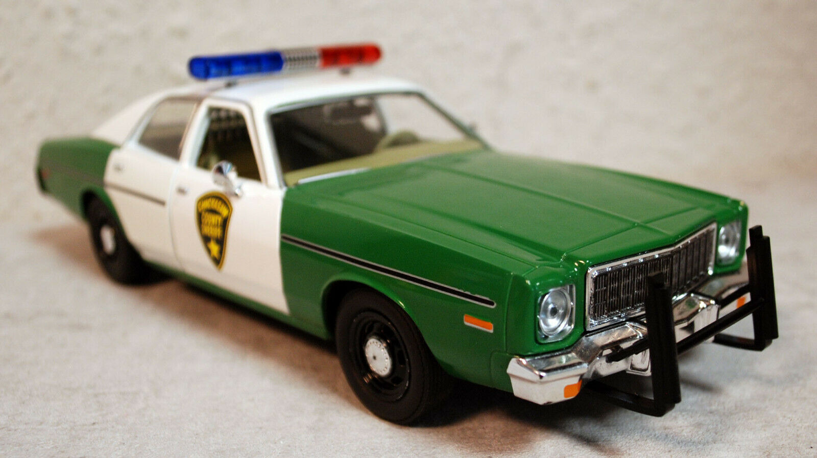 1975 Plymouth Fury Chickasaw County Sheriff 1:24 Green Light 84096