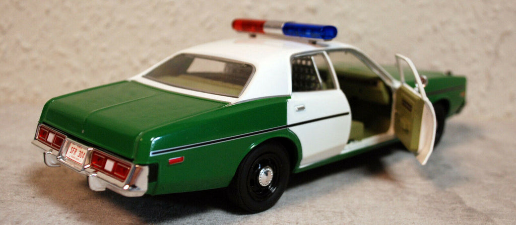 1975 Plymouth Fury Chickasaw County Sheriff 1:24 Green Light 84096