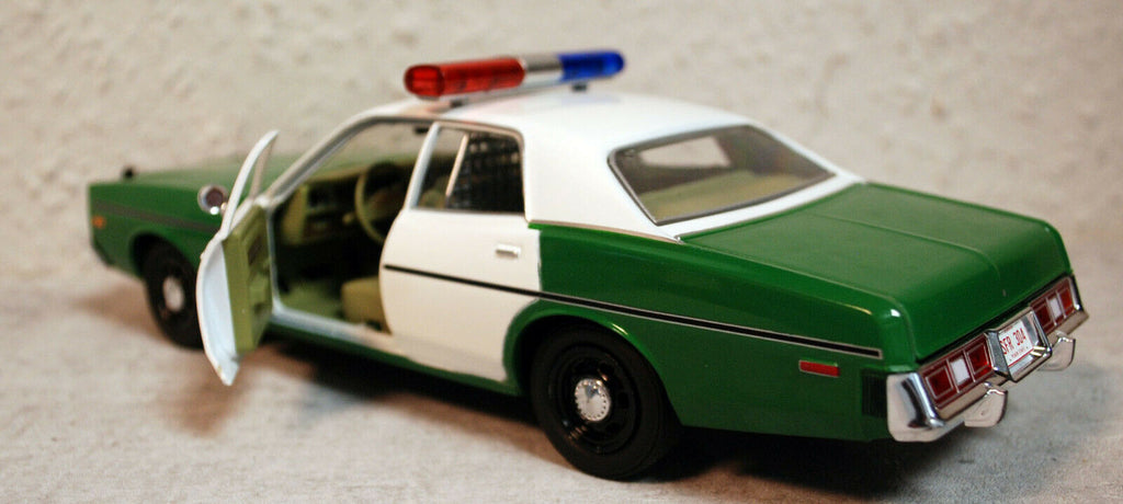 1975 Plymouth Fury Chickasaw County Sheriff 1:24 Green Light 84096